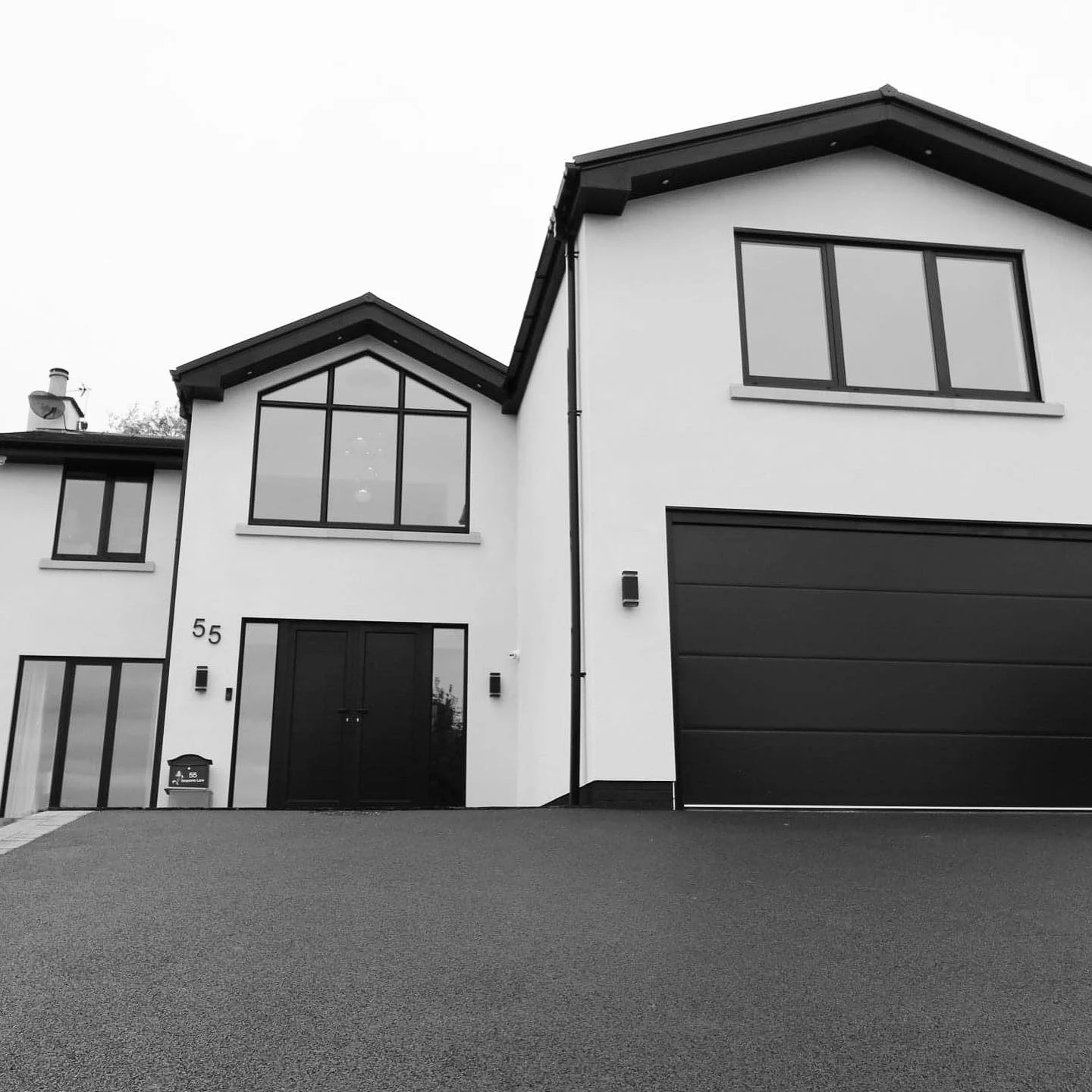 Entrance, gables & garage